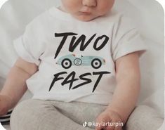 a baby wearing a t - shirt that says two fast with a car on it