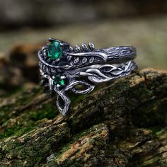 These sterling silver rings, inspired by the beauty of nature, showcase a unique blend of Celtic and Elven designs. The set features delicate stacking rings adorned with birthstones and intricate leaf branches, adding a whimsical touch to the overall design.  Characteristics: Metal - Recycled solid sterling silver  Stone - Cubic Zirconia Finish - Oxidized. View all silver forest rings: https://www.etsy.com/shop/TinyShinyJewel?ref=seller-platform-mcnav&section_id=43358995 Care instructions: To care for the ring, avoid contact with water and chemicals such as perfumes and lotions. When the ring is not in use, store it in a dry, cool place to prevent tarnishing. Additional information:  ✦ All rings are made to order. An average turnaround time is 1-5 days. I will make every effort to ship the Mystical Diamond Promise Ring, Mystical Diamond Rings For Promise Ring, Silver Birthstone Jewelry With Magical Style, Mystical Diamond Jewelry For Anniversary, Magical Sterling Silver Jewelry For Promise, Nature-inspired Sterling Silver Wedding Jewelry, Nature-inspired Sterling Silver Wedding Rings, Spiritual White Gold Rings For Wedding, Spiritual White Gold Wedding Rings