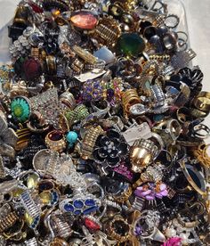 I will pick from my huge selection of fashion Stretch & Adjustable rings. So many beautiful designs. Lots of sparkly goodness! Rhinestones, crystals, every style you can think of. Ring styles may include silver tone, gold tone, plated, pewter, stainless steel, copper & enamel. No damaged items in this listing, there is a special listing for that.  Get your Bling on! ** This listing is for 25 Stretch / Adjustable Rings Bling Ring, Ring Styles, Grab Bag, Bling Rings, Fashion Ring, Grab Bags, Multi Stone Ring, Adjustable Rings, Style Icons