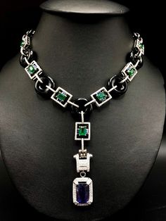 "So Perfect Jewelry Boutique proudly presents \"The Ultimate-Art-Deco Emerald & Sapphires Necklace\". Extremely stunning with TOP VIVID GREEN, ZAMBIAN EMERALDS! 100%. GUARANTEE!! CERTIFIED! With over 524 HANDSET, natural E/VS diamonds! Set in handcrafted 18K solid white gold setting. A DREAM COMES TRUE! Gorgeous masterpiece! Ultimate ART-DECO Style Necklace! Featuring an ENORMOUS & extra rare UNHEATED, 12.99 carats, color change sapphire, 7 pieces of VIVID GREEN, Zambian emerald weightin Fantasy Pendant, Emerald Green Necklace, Gold Necklace Pendant, Color Change Sapphire, Ceylon Blue Sapphire, Emerald Blue, White Gold Necklace, Jewelry Boutique, Zambian Emerald