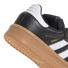 Once an indoor soccer shoe and now a style staple, the adidas Samba has been an icon for 70 years and counting. These juniors' Samba XLG shoes carry on the legacy with a new attitude. The signature elements are there, from the serrated 3-Stripes to the T-toe. Thick tooling takes cues from skatepark style, with a padded tongue and EVA midsole for extra comfort in every step. Vans Top, Running Cap, Indoor Soccer, Bra Dress, Lifestyle Art, Nike Acg, Newest Jordans, Jogger Shorts, Mule Sandals