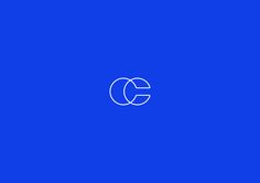 a blue background with the letter c in it's center and two smaller letters at the bottom