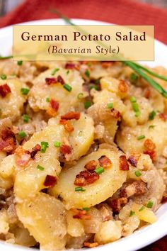 german potato salad with bacon and chives in a white bowl