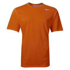 Nike Legend Poly Top. Train with the Swoosh and feel the difference. Dri-FIT training top looks like a tee but performs like a training jersey. Lightweight, moisture wicking training top with screened Nike logo. 100% polyester. Tennis Uniforms, Jersey Nike, Nike Short, Training Tops, Nike Mens, Workout Tee, Nike Logo, Dri Fit, Nike Men