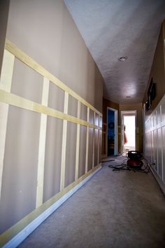 the hallway is empty and ready to be used as a room divider for storage