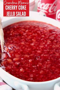 a white bowl filled with cherry coke jello salad