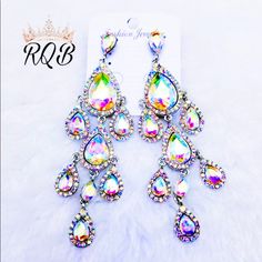 Dangle Design Auroura Borealas Pierced Rainbow Effect Pageant Earrings Luxury Rainbow Colored Fine Jewelry Earrings, Multicolor Bling Crystal Earrings, Nickel-free Rainbow Dangle Hoop Earrings, Luxury Rainbow Gemstone Earrings, Rainbow Multi-stone Cubic Zirconia Jewelry, Pageant Earrings, Real Queens, Queen Bees, Real Women