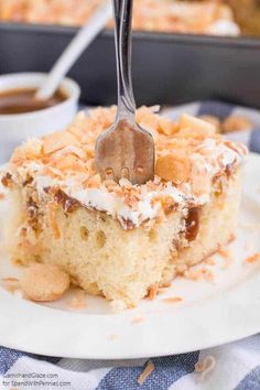 a piece of cake on a plate with a fork in it