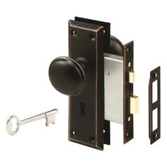 an image of a door handle with a key on the front and side lock to open it