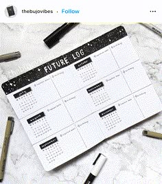 an image of a calendar with the words future los on it and some markers next to it