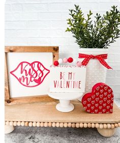 two valentine's day decorations on a table