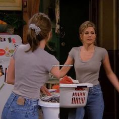 two women standing in front of a washing machine