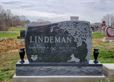 the headstone of lindeman is shown in front of a cemetery with graves