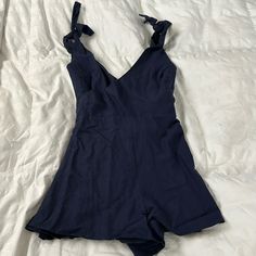 Navy Blue Game Day Romper. Never Worn. Blue Casual Jumpsuits And Rompers For Date Night, Blue Jumpsuits And Rompers For Date Night In Spring, Casual Blue Jumpsuits And Rompers For Date Night, Blue Jumpsuits And Rompers For Summer Date Night, Blue Fitted Jumpsuits And Rompers For Brunch, Chic Blue Cotton Jumpsuits And Rompers, Blue Jumpsuit For Date Night In Summer, Blue Fitted Summer Jumpsuits And Rompers, Blue Summer Party Jumpsuits And Rompers