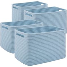 three blue storage baskets sitting next to each other