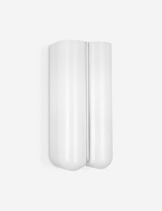 two white cylindrical objects against a white background