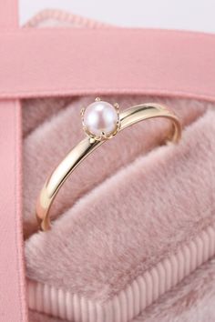 This stunning pearl ring is perfect to wear at any occassion. Made in pure gold. #morganitering #diamondring #gemstonering #engagementring #vintagering Elegant Couple Rings With Prong Setting For Gift, Elegant Couple Rings With Prong Setting, Wedding Jewelry Open Ring With Solitaire, Elegant Gold Flower Ring With Round Band, Solitaire Open Ring Wedding Jewelry, Elegant Yellow Gold Flower Ring With Round Band, 14k Yellow Gold Pearl Promise Ring, Elegant Gold Opal Open Ring, Yellow Gold Pearl Ring For Promise With Prong Setting