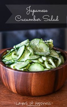 japanese cucumber salad in a wooden bowl with text overlay that reads, japanese cucumber salad