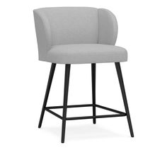 an upholstered stool with black legs and a light gray fabric seat, viewed from the front