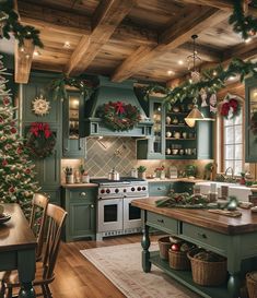 a kitchen decorated for christmas with greenery and garlands on the ceiling, green cabinets