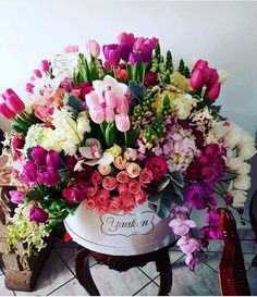 a bouquet of flowers sitting on top of a table