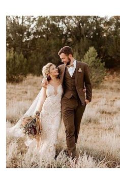 a bride and groom are walking through the grass