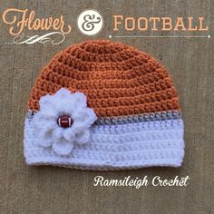 a crocheted hat with a flower and football on it