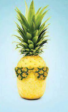 a pineapple with sunglasses on it's head