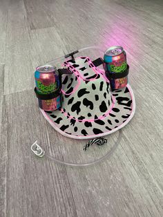 "**Be sure to check out my new website linked on my page or by going to www.howdy.company! A fun, neon style, cowboy hat with cup holders for two cans and a straw. Each hat is made to order to match your color preferences for both the Iights and the hat itself. The Iights give the hat a cool mix between futuristic and western looks. I love seeing all of the different color combinations people come up with. My personal favorites are the pink Iights with the pink hat or the aqua Iights with the wh Dr Pepper Cowboy Hat, Fun Cowboy Hats, Fun Adjustable Mini Hats For Rodeo, Adjustable Fun Hat For Western-themed Events, Fun Mini Hats For Summer Rodeo, Western Mini Hats For Summer Rodeo, Country Style Summer Costume Hats For Rodeo, Country Style Costume Hats And Headpieces For Summer Rodeo, Cowboy Hats Decorated