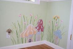 a room painted with mushrooms and flowers on the wall