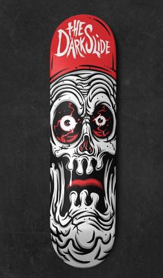 a skateboard with a skull painted on it's face and the words, the darkside