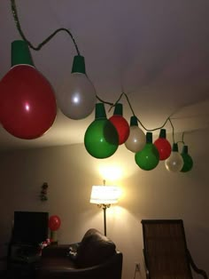 christmas lights hanging from the ceiling in a living room