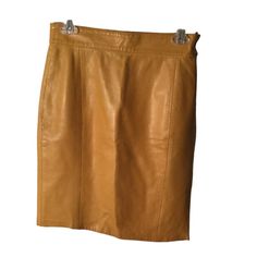 Exude Elegance With This Moschino Gold Yellow Leather Skirt. Crafted In Italy, It's A Wardrobe Staple For Women Who Appreciate Luxury And Style. Perfect For Size Small. Moschino Brand Women's Size Small Crafted In Italy Gold Yellow Color Genuine Leather Material Size: Womens S Measurements: Waist 14 In / 36 Cm Hip 18 In / 46 Cm Length 20.5 In / 52 Cm Features: Skirt Condition: Pre-Owned Clean, Gently Used See Measurements For A Great Fit! "Power Selling Mom Consignment" Yellow Leather Skirt, Gold Yellow Color, Yellow Leather, Gold Yellow, Leather Material, Yellow Color, Moschino, Wardrobe Staples, Leather Skirt