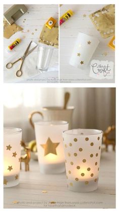 gold stars are on the table next to candles and other items that have been made out of paper