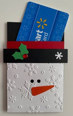 a christmas card with a snowman's face on it