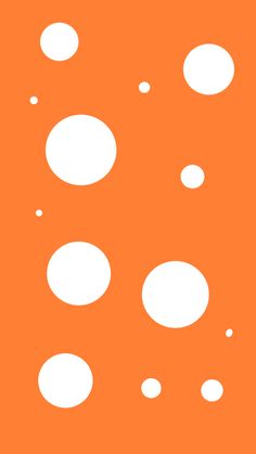 an orange background with white circles