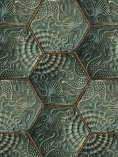 an image of a tile pattern that looks like hexagonal tiles with intricate designs