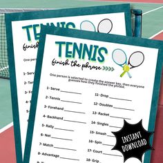 two tennis rackets are next to a score sheet on a court with the words tennis