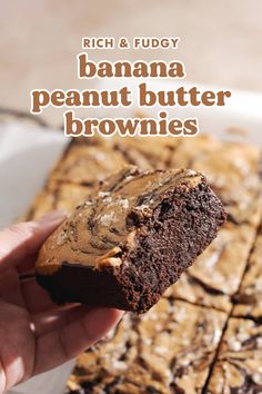 a hand holding a piece of brownie with peanut butter on it and the words rich & fudgey banana peanut butter brownies