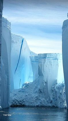 an ice cave with snow on the ground