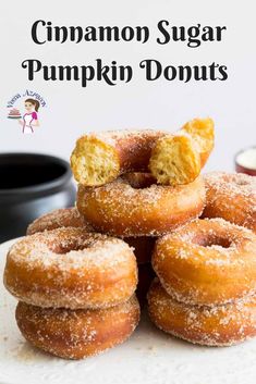 cinnamon sugar pumpkin donuts stacked on top of each other with the title above it