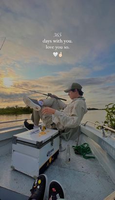 a man sitting on top of a boat while fishing