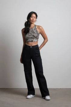 The Marina Del Rey Black Stitch Wide Leg Jeans are your new wardrobe staple. These high waisted jeans feature a front button and zipper closure, two front pockets, two back pockets, and exposed stitch details. Pair with an animal print crop tank top and tennis shoes for a laid-back, street aesthetic. Stitch Jeans, Black Stitch, Street Aesthetic, Fall Wedding Guest Dress