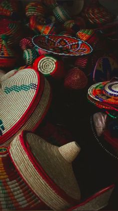 baskets are stacked on top of each other in the shape of heart shaped shapes and colors