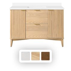 an image of a bathroom vanity with two drawers and three colors on the counter top