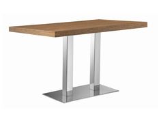 a wooden table with metal legs on a white background