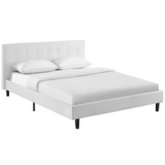 a bed with white linens and pillows on top of the headboard, in front of a white background