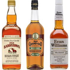 three bottles of different types of bourbon