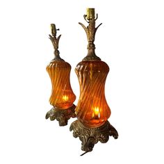 VTG Mid Century Falkenstein Amber Glass Regency brass large set of table lamps
Very detailed vintage lamp set 
Great vintage condition please see all pictures
Fully functional 
Height 22 inches measurement in picture
Length at base is 7 inches and 8 inches deep 
Has lightbulbs in the interior of the glass very rare! 
Would look beautiful in any space
Questions? Please ask
I ship next day Vintage Lamp, Lightbulbs, Lamp Set, Vintage Orange, Lamp Sets, Vintage Lamps, Amber Glass, Home Accessory, Table Lamps