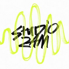 the word art is written in black and neon green ink on a white paper background